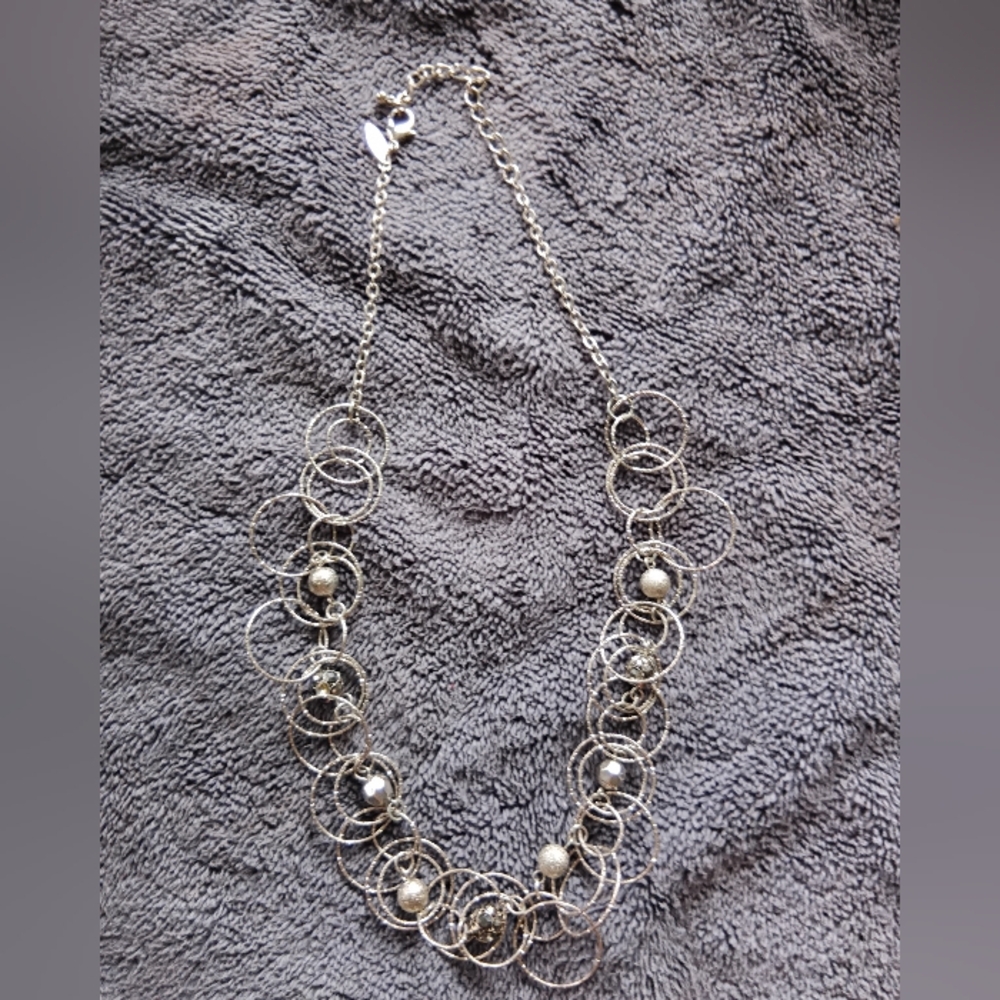 Elegant Silver Necklace with Circular Accents